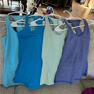 4 blue lululemon tanks